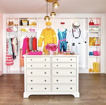 Room, Pink, Chest of drawers, Furniture, Interior design, Wall, Shelf, Drawer, Building, Wallpaper, 