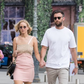 White, Clothing, Fashion, Street fashion, Shoulder, Walking, Sunglasses, Dress, Eyewear, Footwear, 
