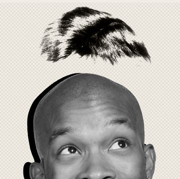 man with toupee hovering above him