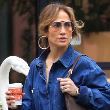 jennifer lopez in a denim leg slit dress